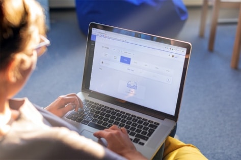 Woman using a web application on a desktop