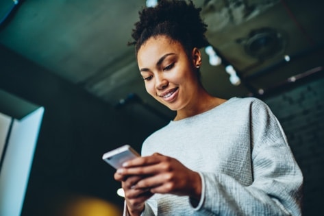 Woman using a telecom app