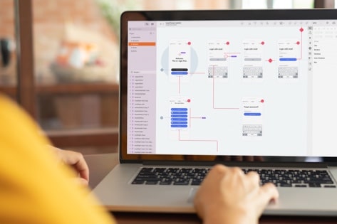 A UX designer creating wireframes