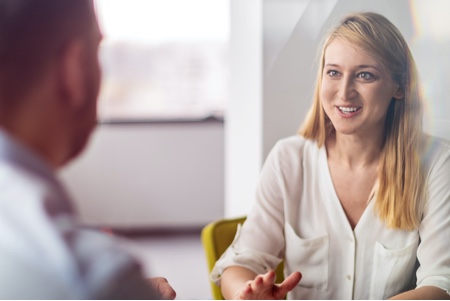Expert discussing different e-commerce solutions with a client